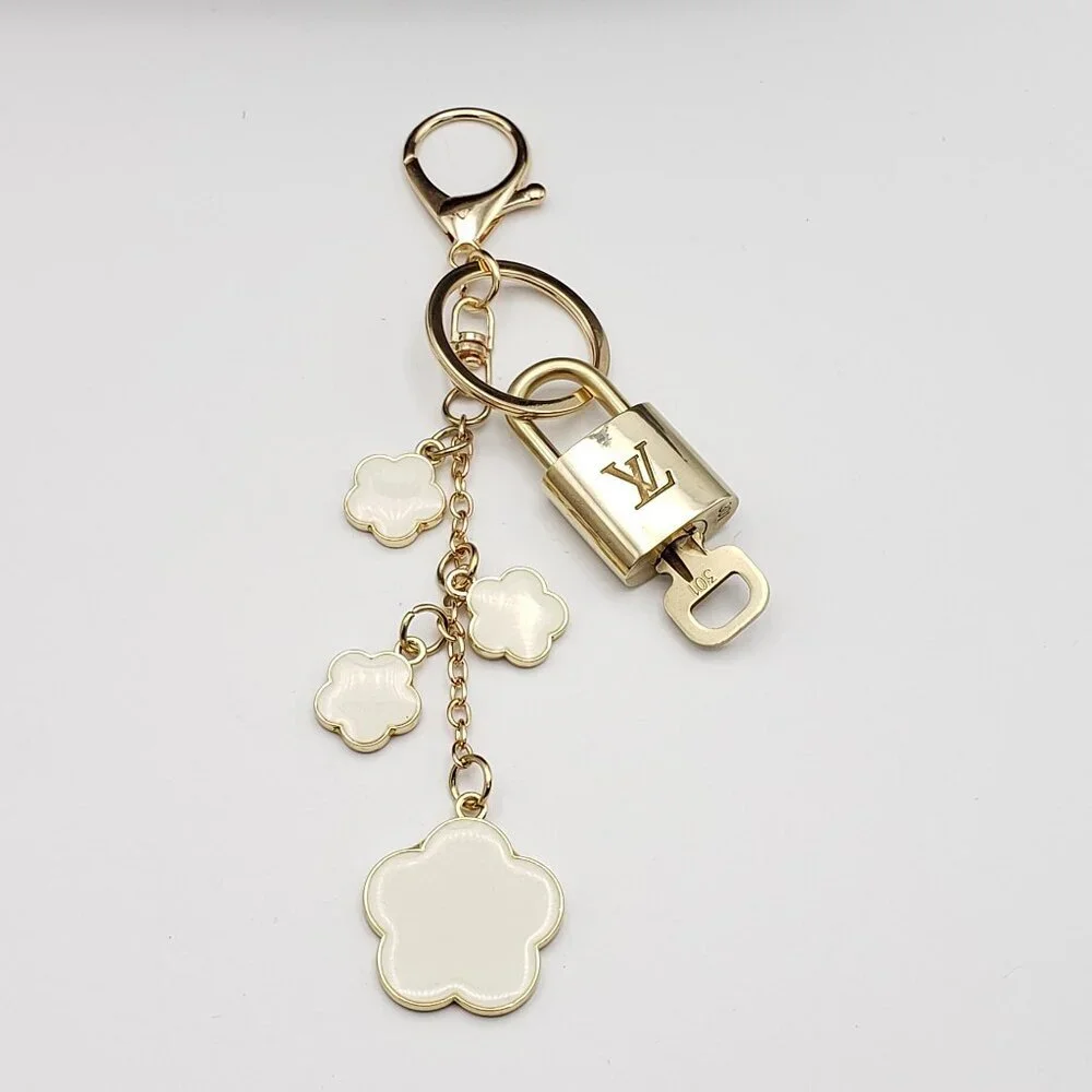 Authentic Louis Vuitton Lock & Key with Unbranded Flower Charm, Keychain